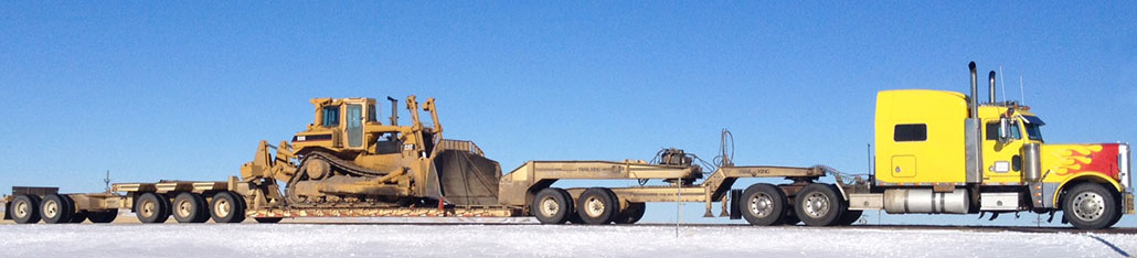 Heavy hauling CAT dozer